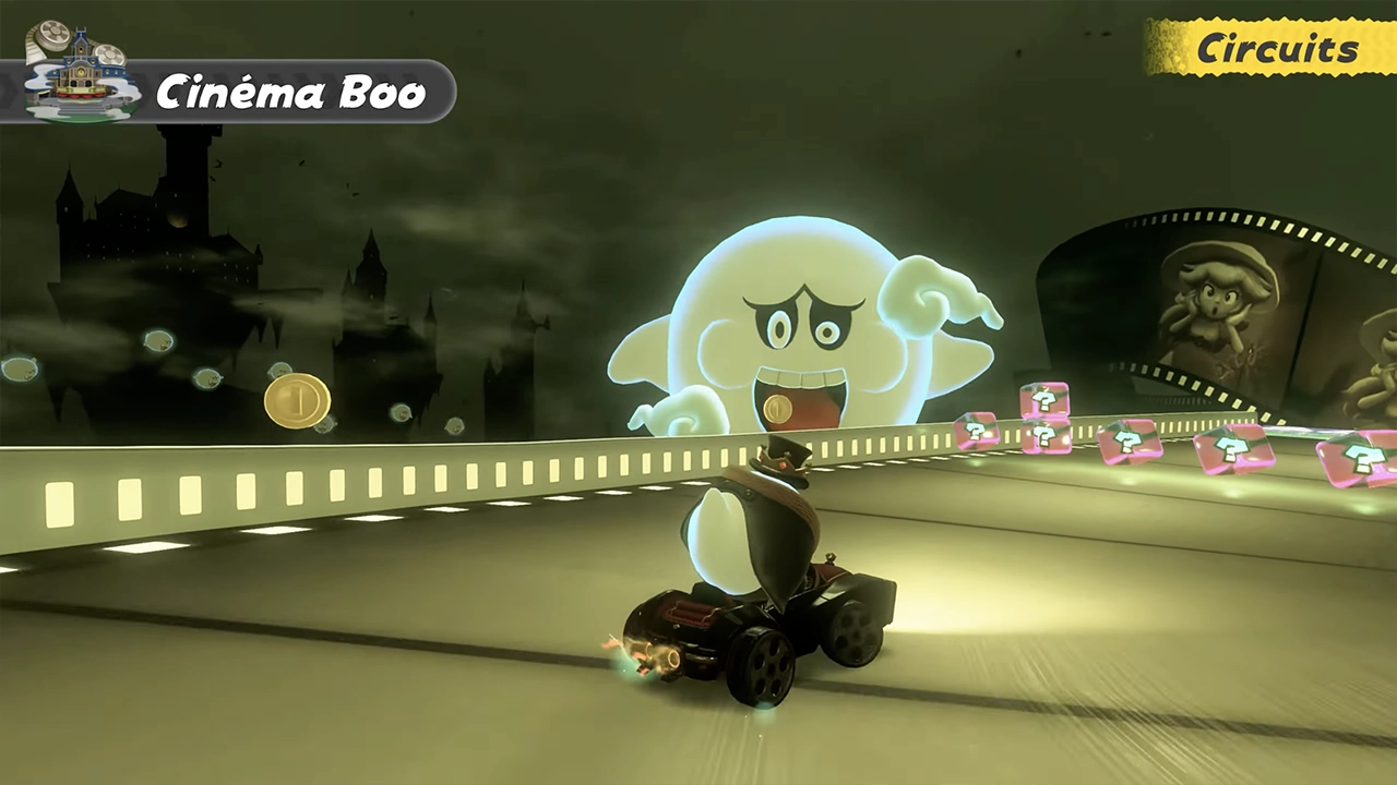 Aperçu d'un grand fantôme en bord de piste dans le Cinéma Boo de Mario Kart World. Aperçu d'un grand fantôme en bord de piste dans le Cinéma Boo de Mario Kart World.