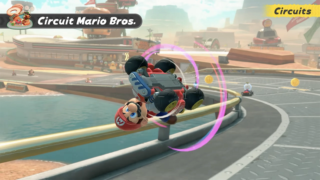 Le Circuit Mario Bros de Mario Kart World nous fait piloter entre les canyons. Le Circuit Mario Bros de Mario Kart World nous fait piloter entre les canyons.