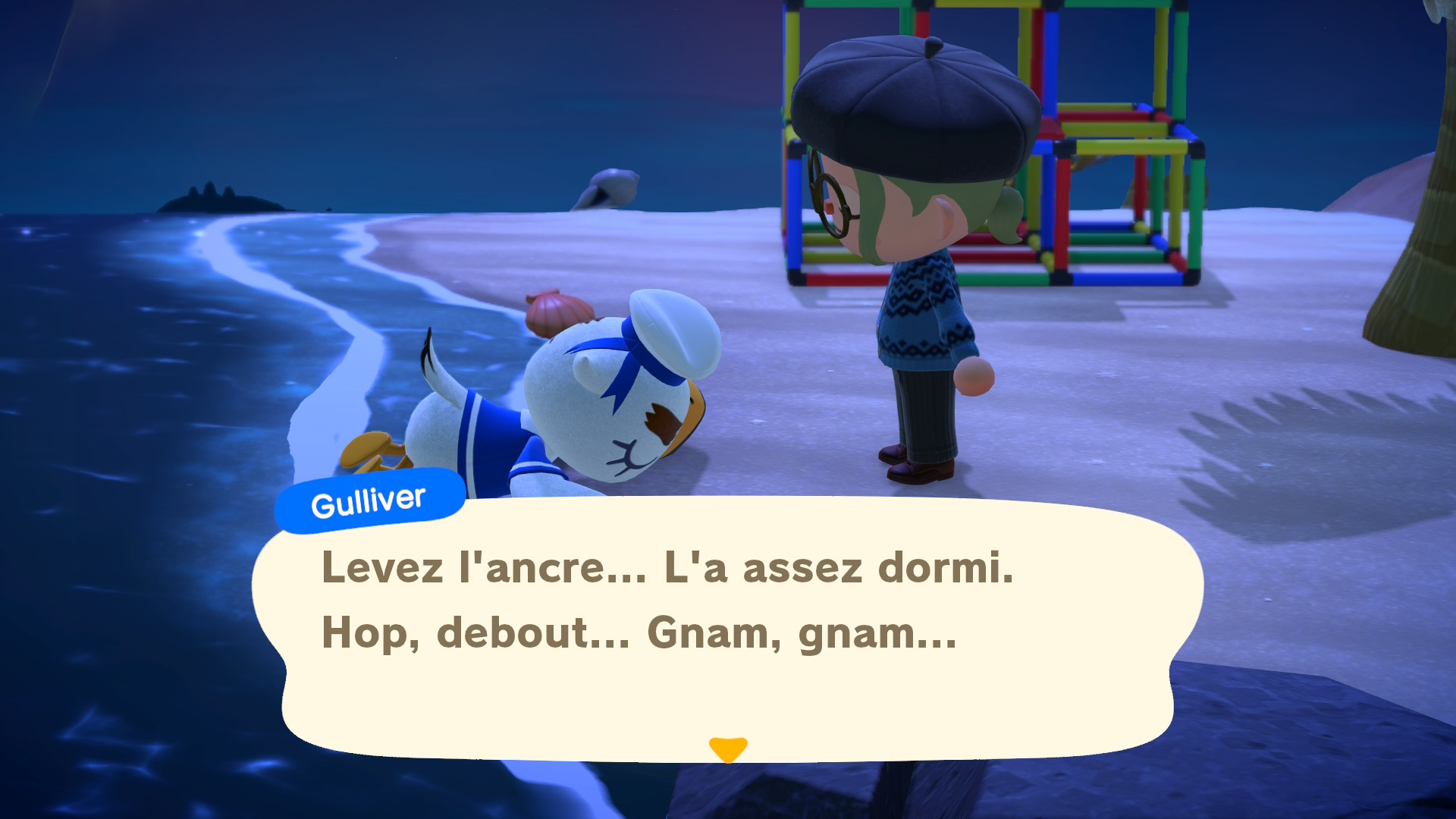 Guilliver endormi sur la plage d'Animal Crossing New Horizons.