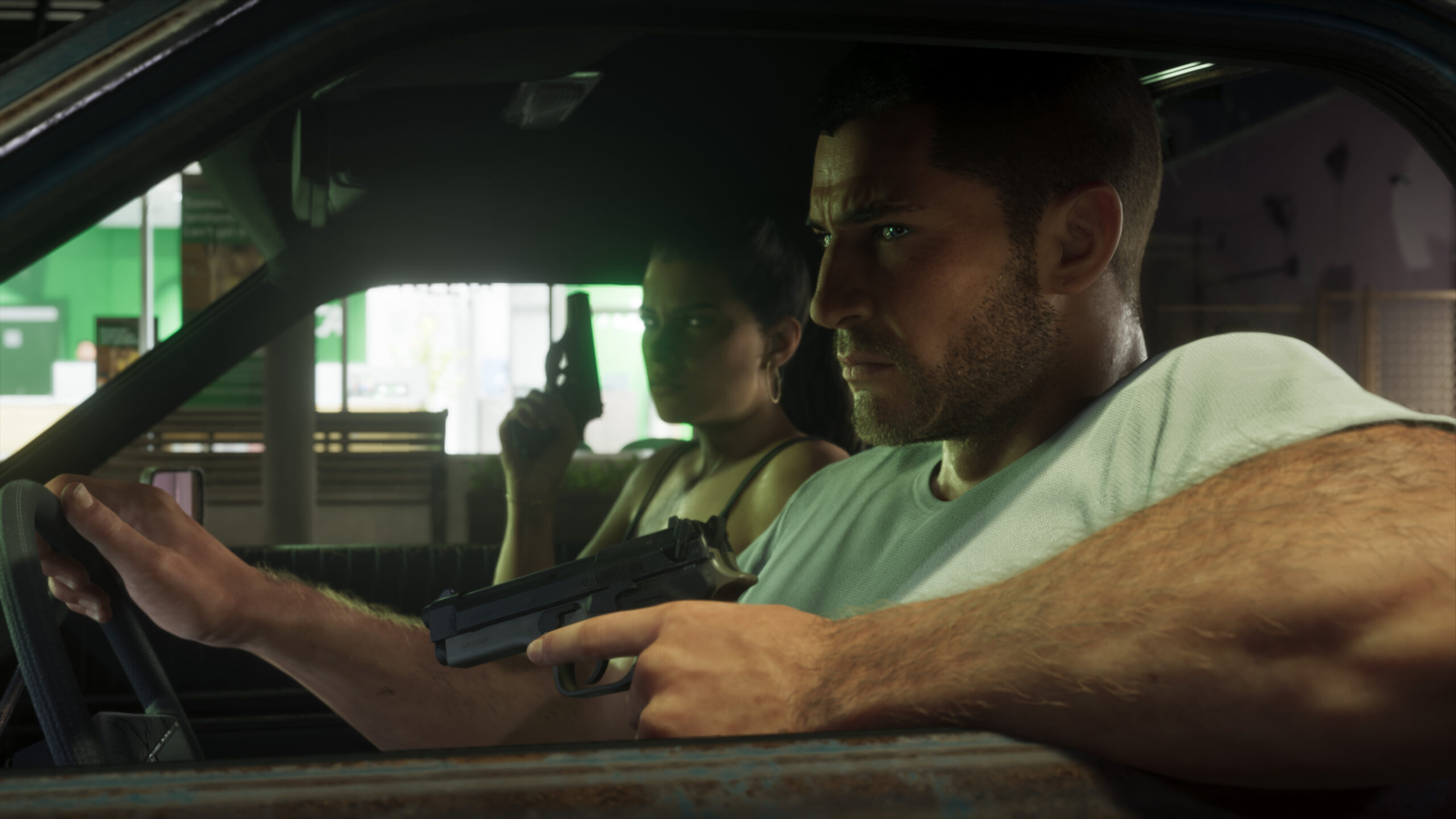 Jason et Lucia en voiture, prêts à commettre un braquage de nuit. Jason et Lucia en voiture, prêts à commettre un braquage de nuit.