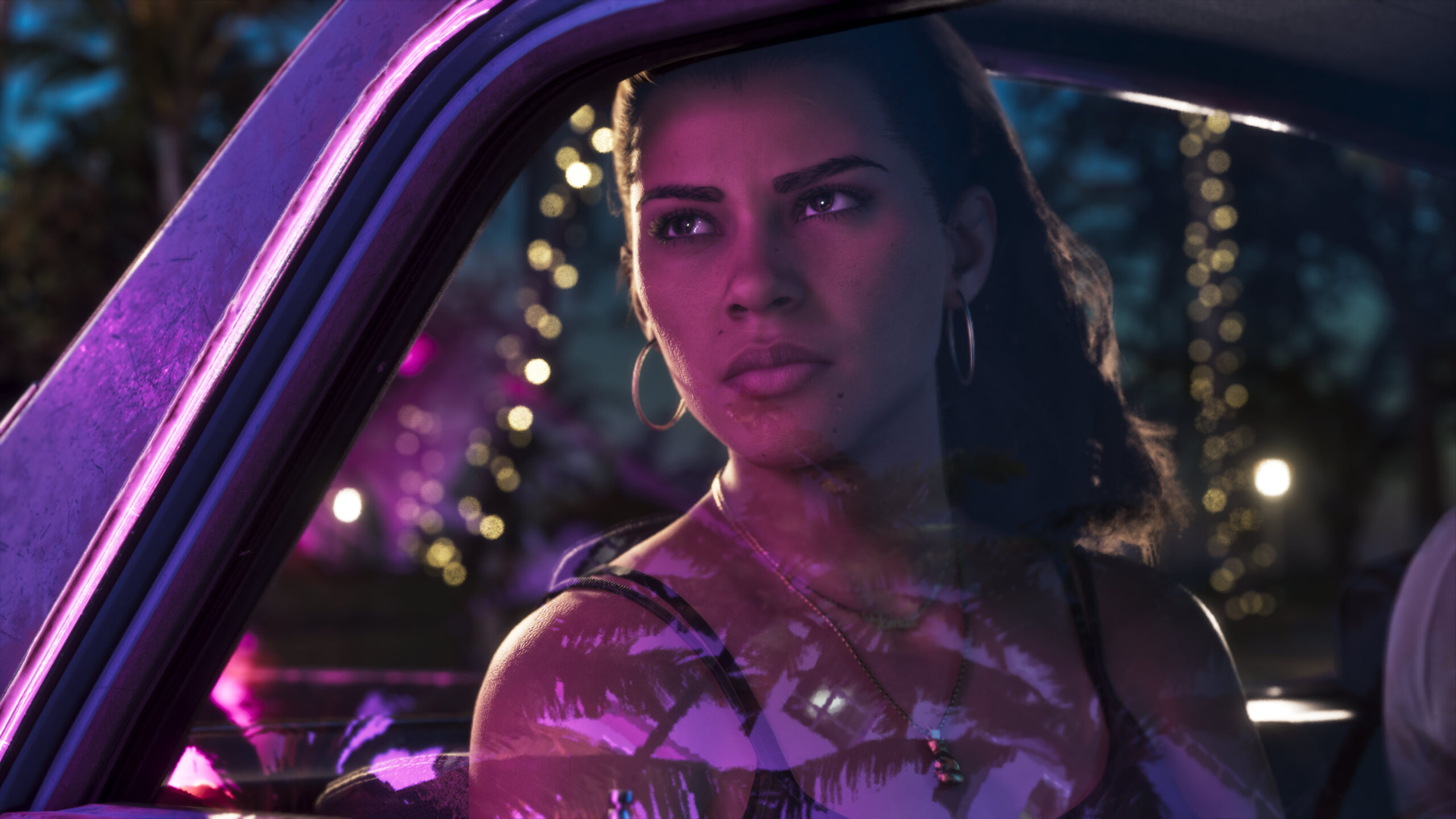 Lucia Caminos dans une voiture de nuit, regardant par la fenÃªtre.