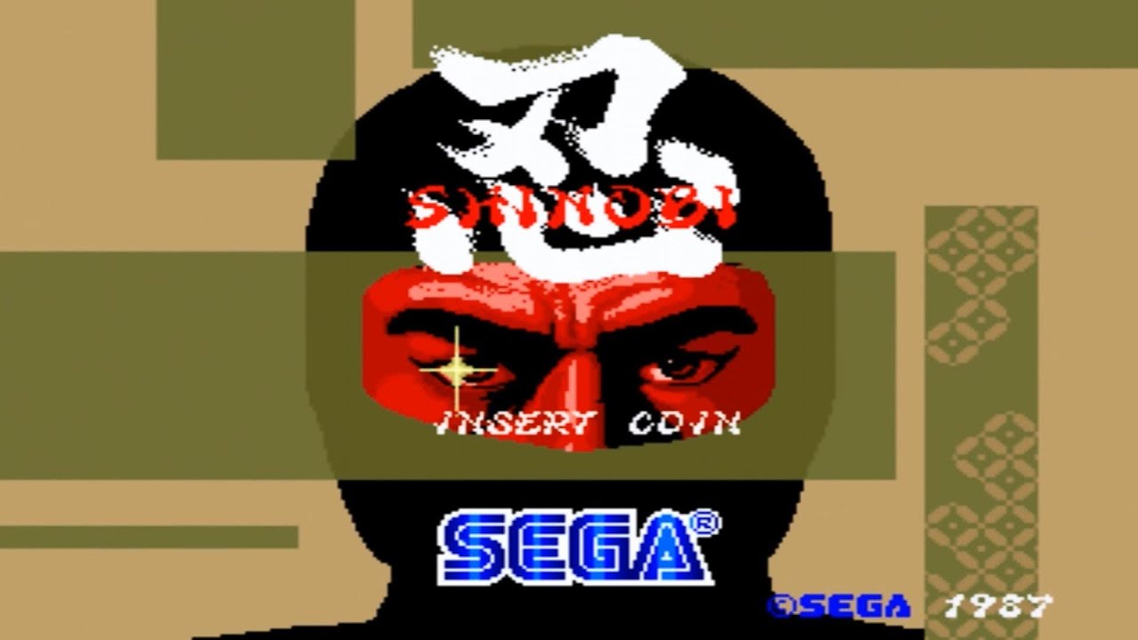 Ãcran titre du jeu Shinobi sur borne d'arcade en 1987. Ãcran titre du jeu Shinobi sur borne d'arcade en 1987.