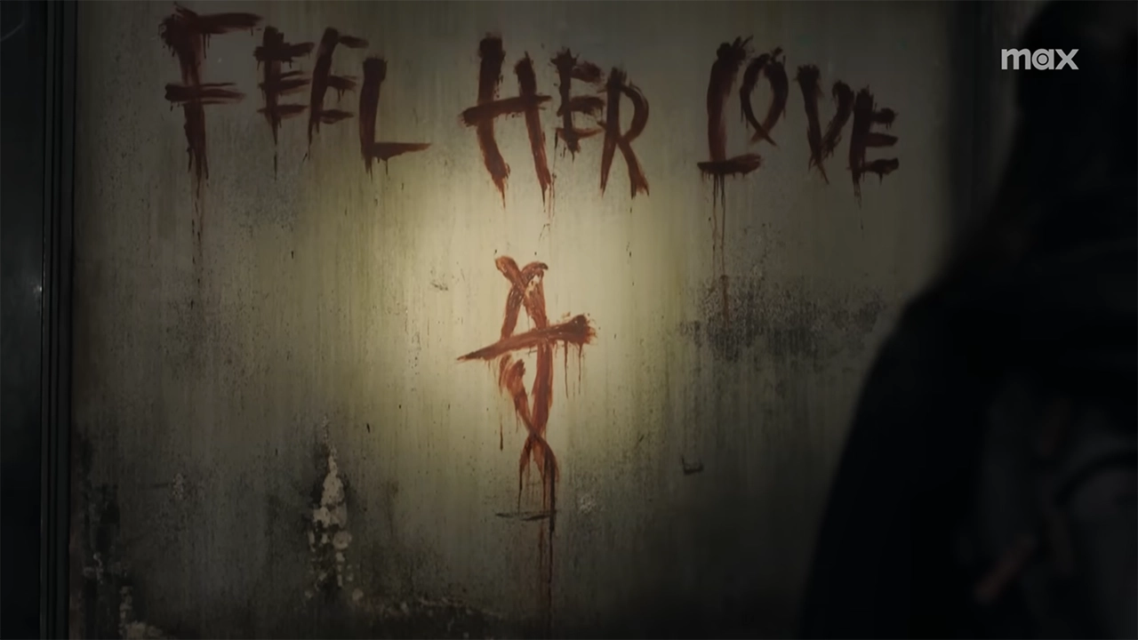 « Feel her love » taggué en rouge sur un mur dans la saison 2 de The Last of Us HBO. « Feel her love » taggué en rouge sur un mur dans la saison 2 de The Last of Us HBO.