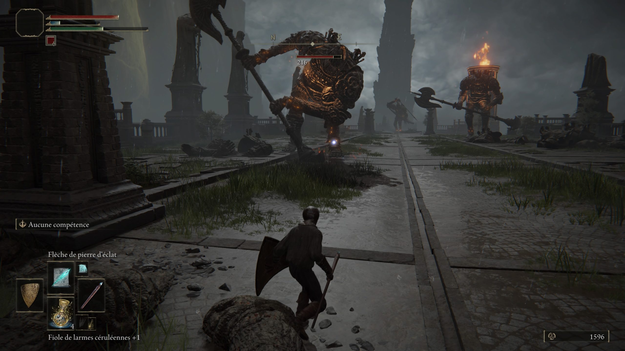 Screenshot de gameplay lors d'un combat de boss dans Elden Ring. Screenshot de gameplay lors d'un combat de boss dans Elden Ring.