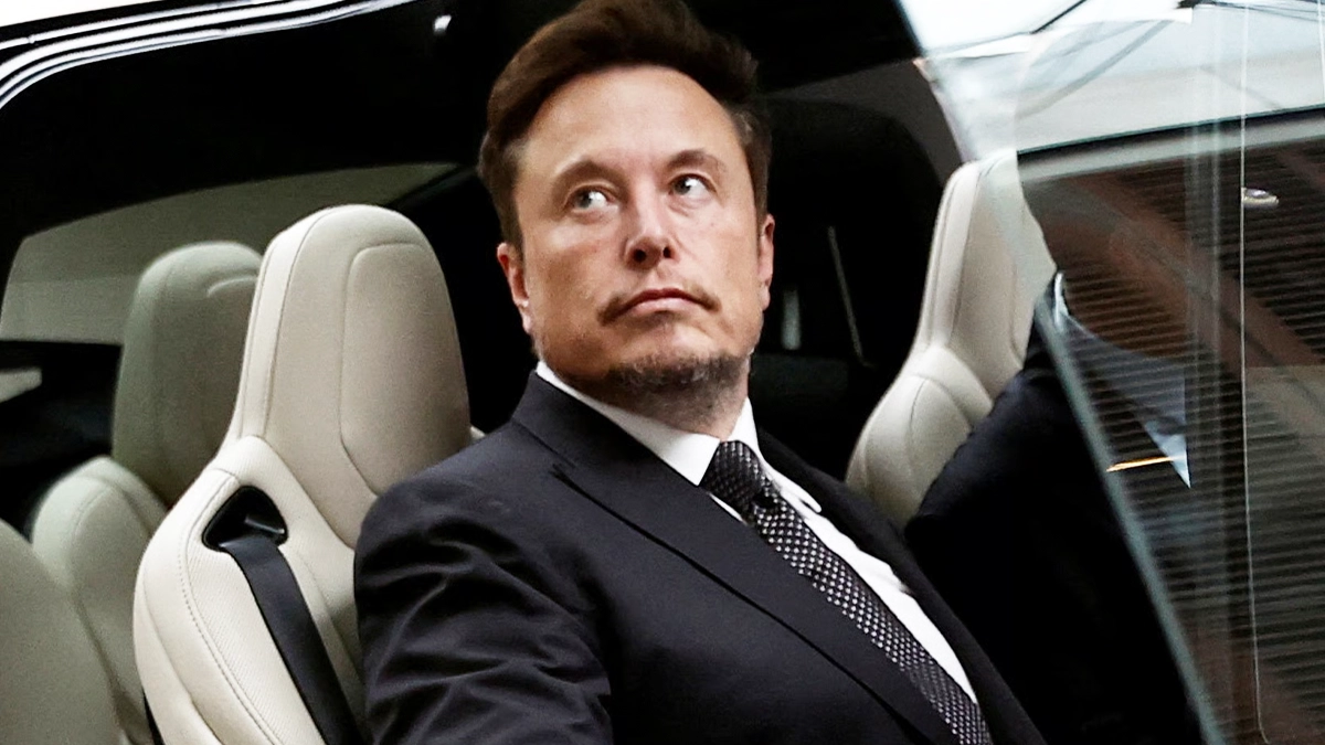 Elon Musk à bord d'une voiture Tesla. Elon Musk à bord d'une voiture Tesla.